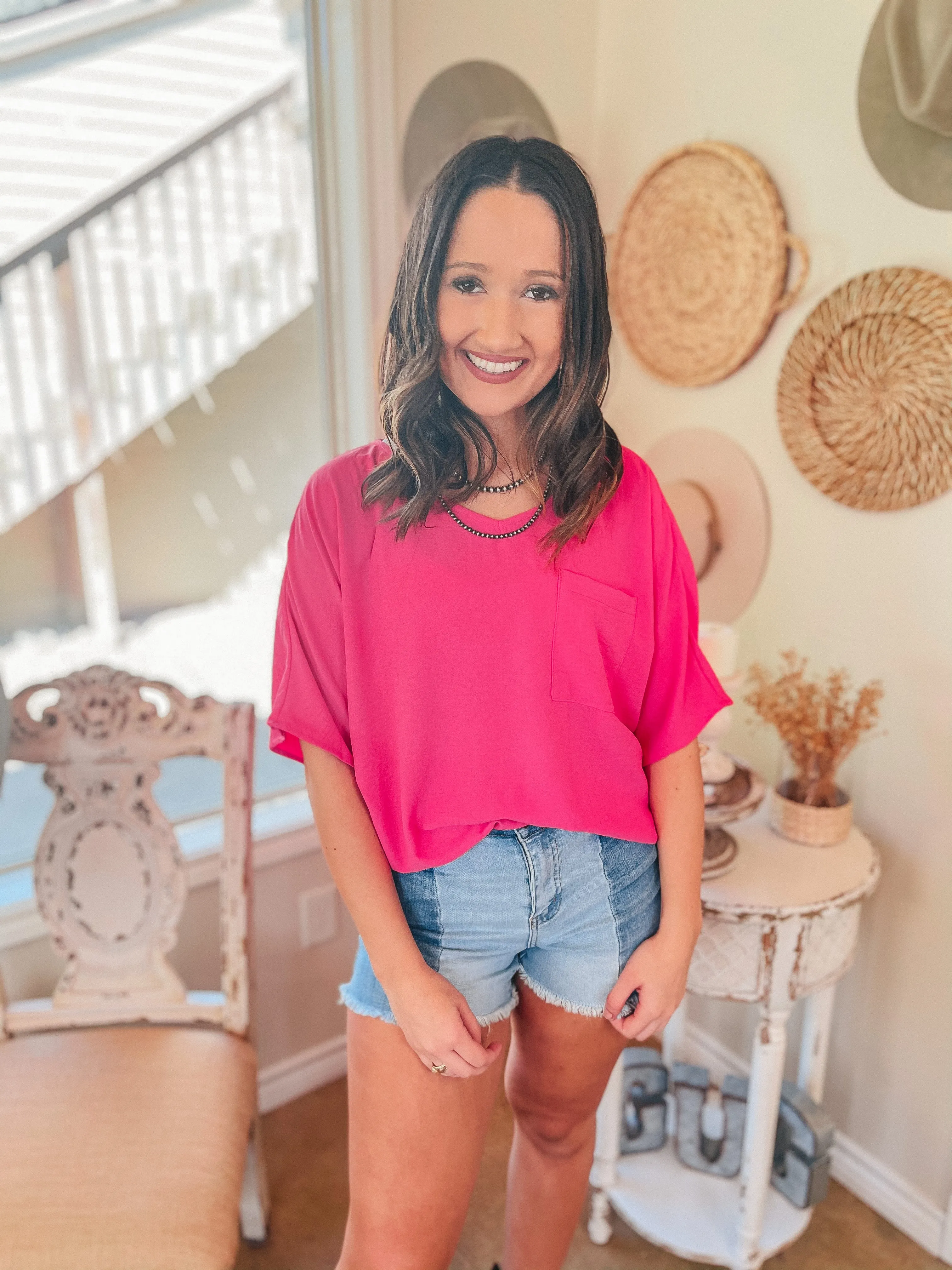 On Record V Neck Short Sleeve Shift Top with Front Pocket in Fuchsia